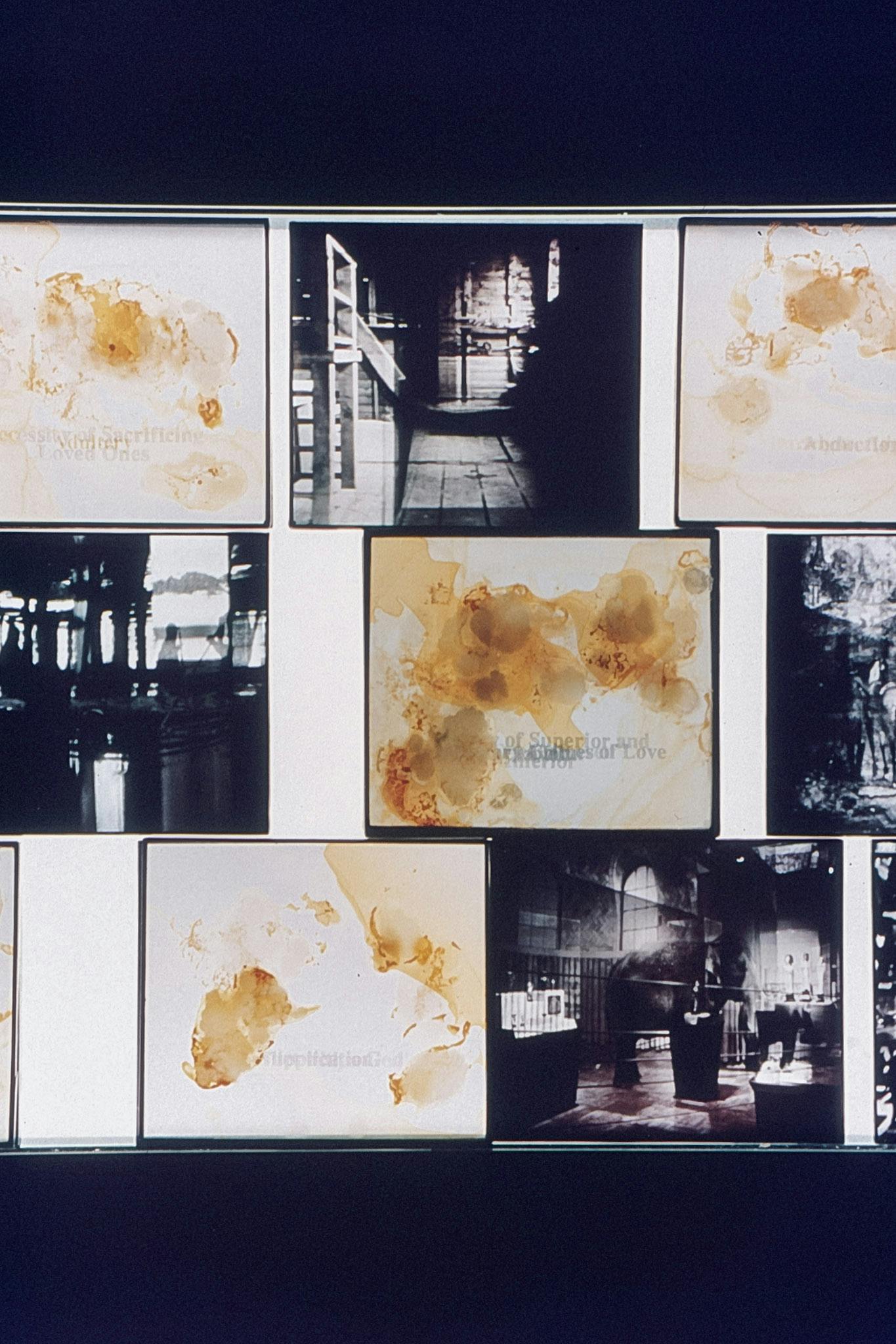 Several photo-transparencies against a glowing white background. They include images of buildings, layered yellow stains and overlaid text. One of the slides with text reads "Abduction." 