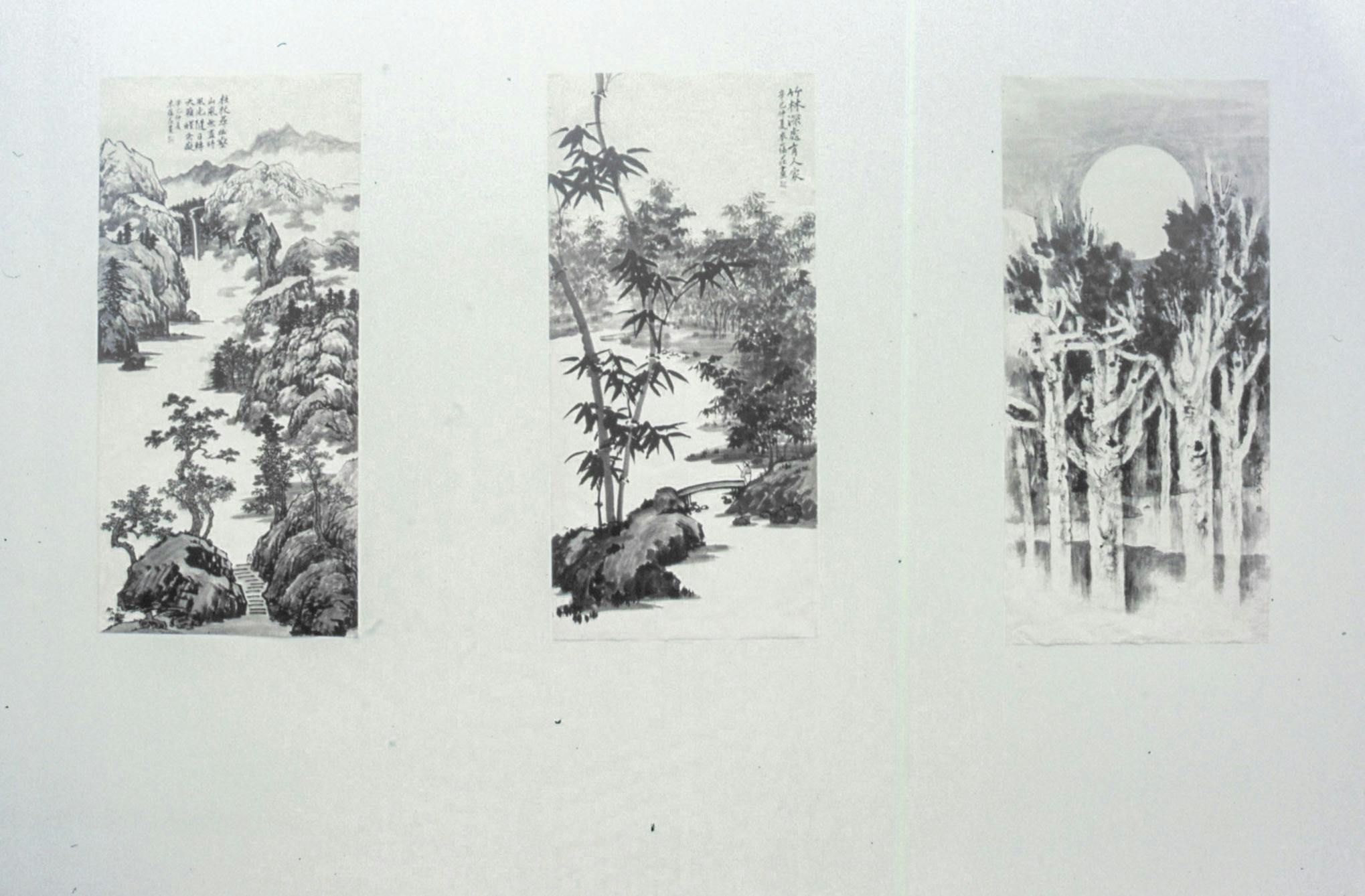 Three black ink landscape paintings are mounted on the gallery wall. They are long hanging scroll paintings. The moon above bear woods, bamboo trees, and rocky mountains are depicted in the painting.