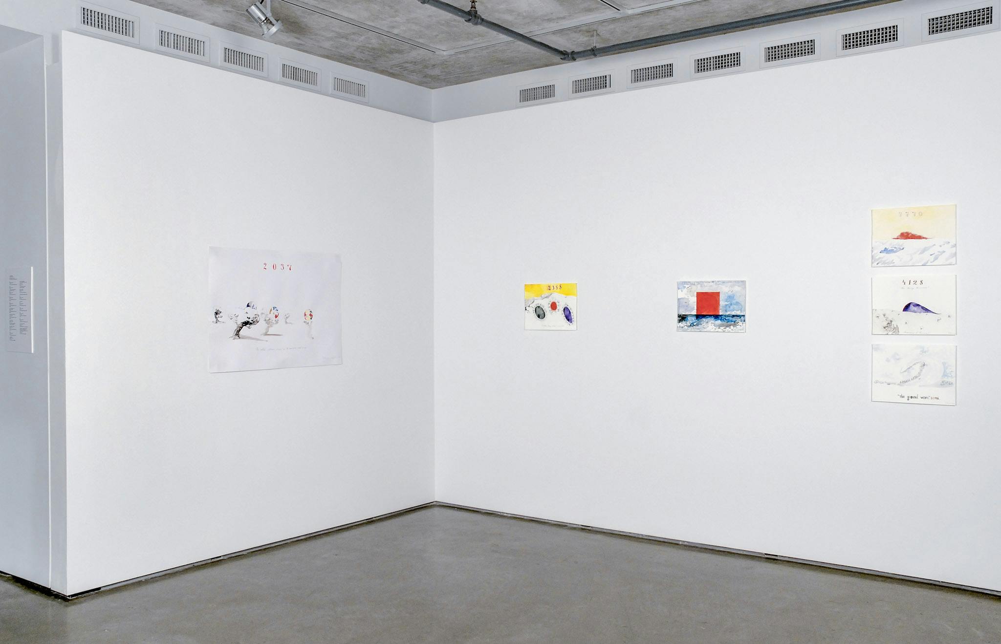 Unframed colour drawings are exhibited in a gallery space. Five pieces on the walls are visible in this image. They depict organic shapes including waves and some single-celled organisms.