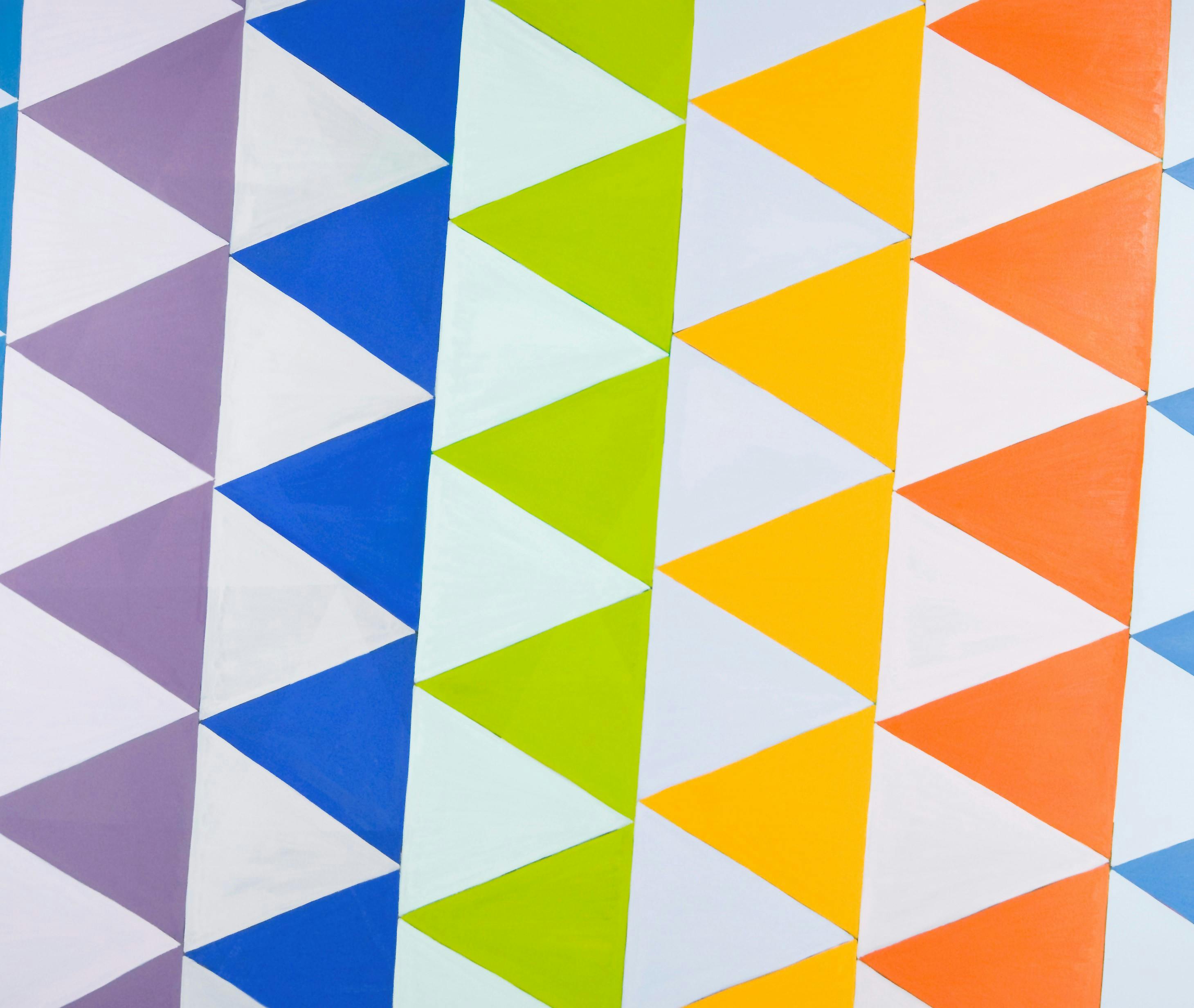 An image of painting composed of vertical rows of purple, blue, green, yellow and orange triangles. 