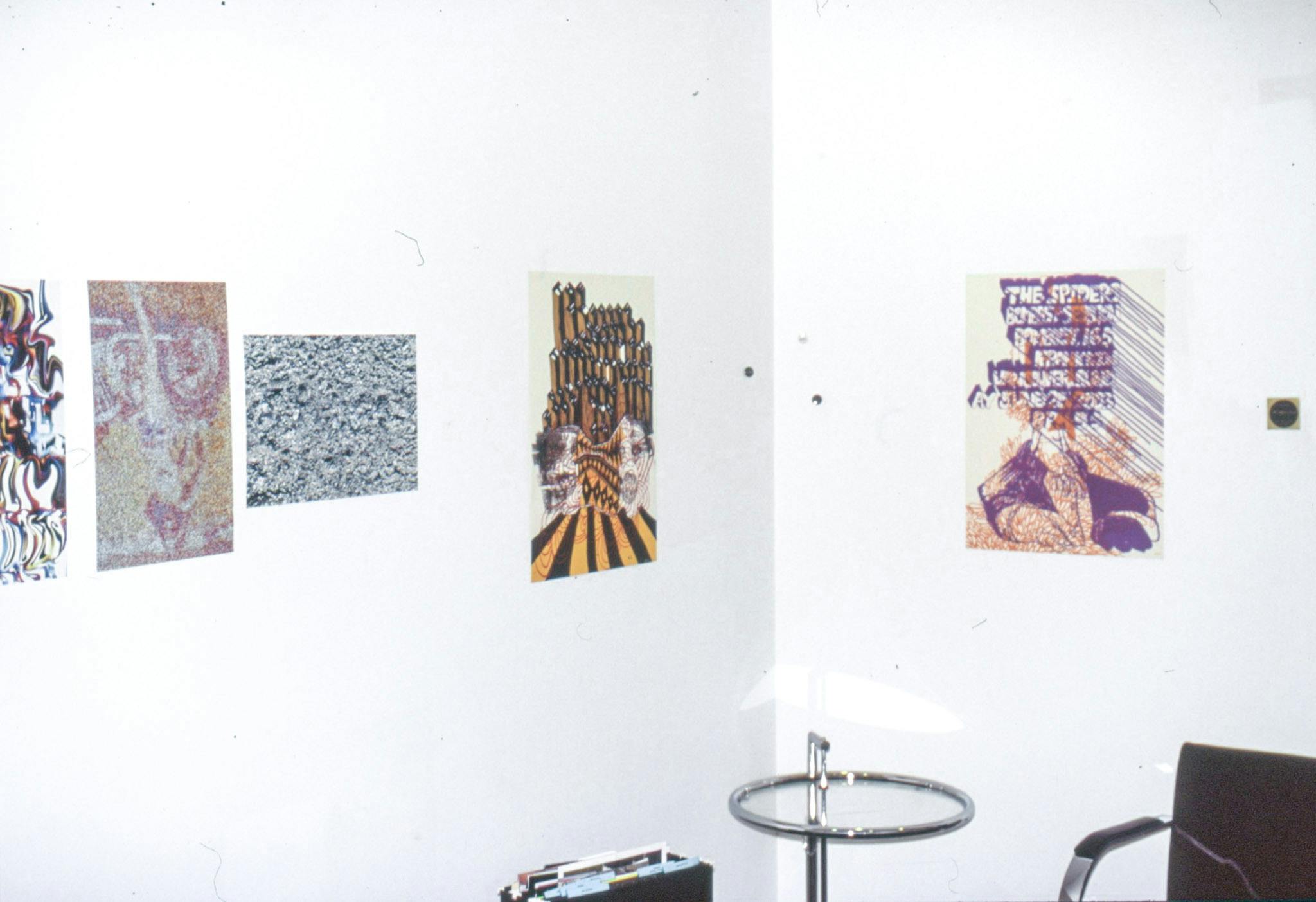 An install image of drawings on gallery walls. Two works closely installed with each other on the left wall are abstract drawings. The other two works show the combination of text and abstracted human-like figures.