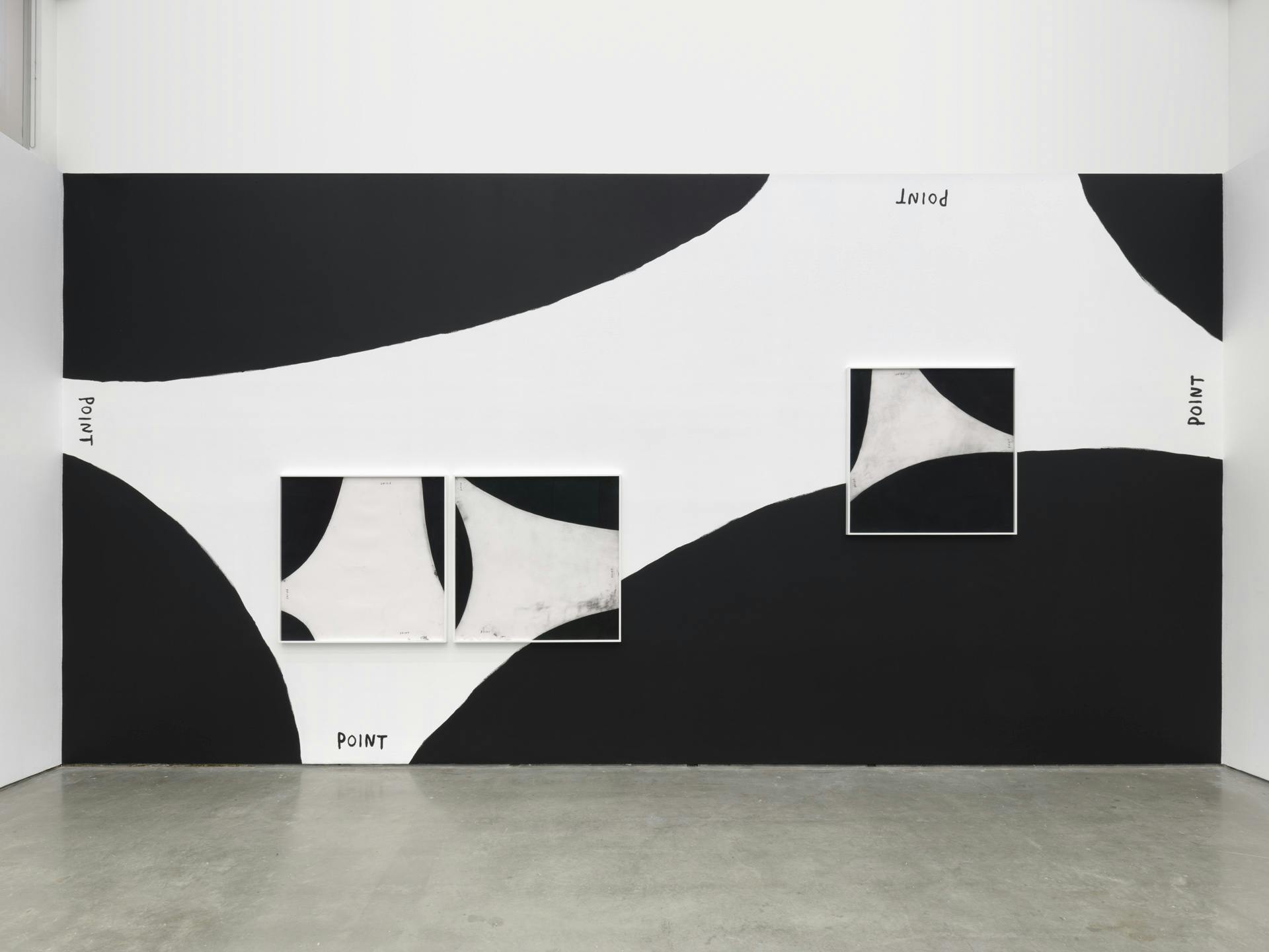 A wall drawing by Christine Sun Kim featuring the word "point" and curved black shapes on a white background, with two similar drawings by Kim hung on top of it.