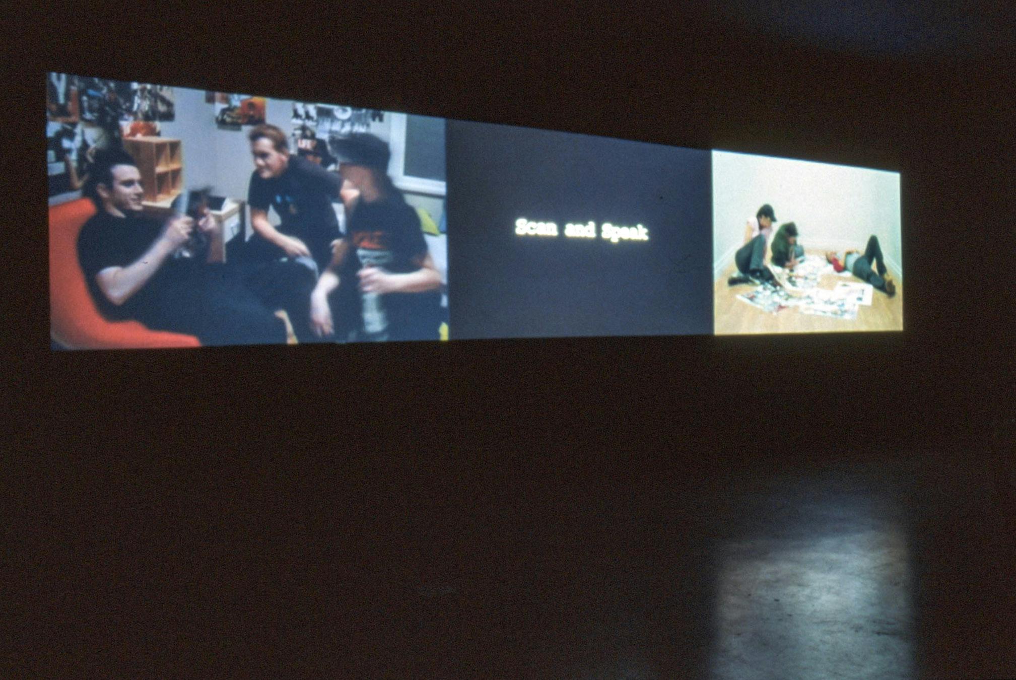 Installation image of a three-channel video by Alex Morrison. Some phrases appear in a black background in the middle video. Two other videos show people hanging out.