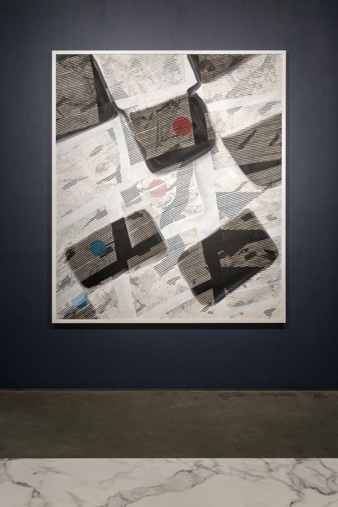 An abstract painting hangs on a navy blue gallery wall. In the foreground of the image a section of a marble bench facing the painting is visible.