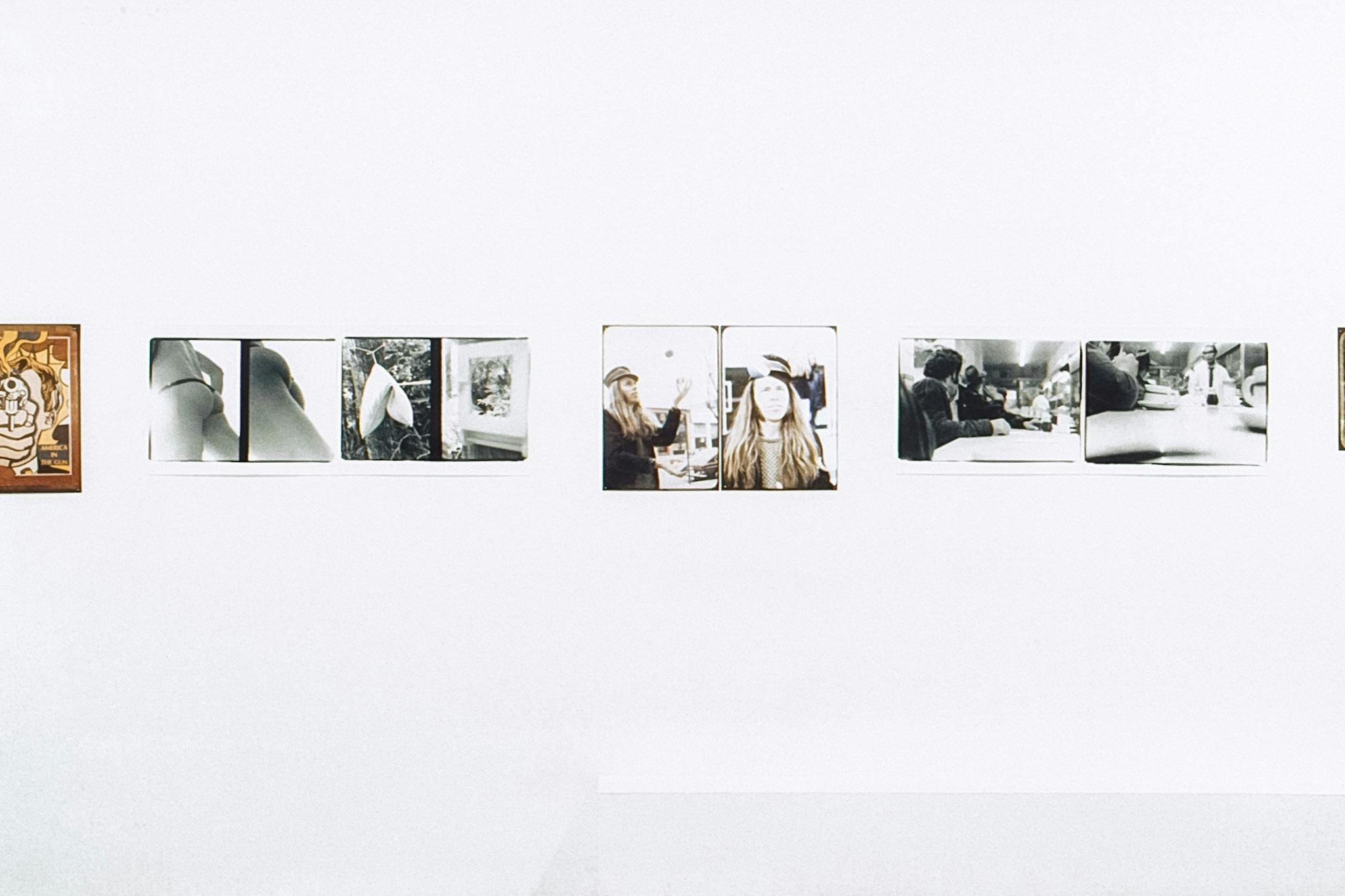 A closeup of a white wall displaying 4 sets of photos. The photos show various things, including: a bum in a thong, a hanging pillow, a person with long hair juggling, and people in a diner. 