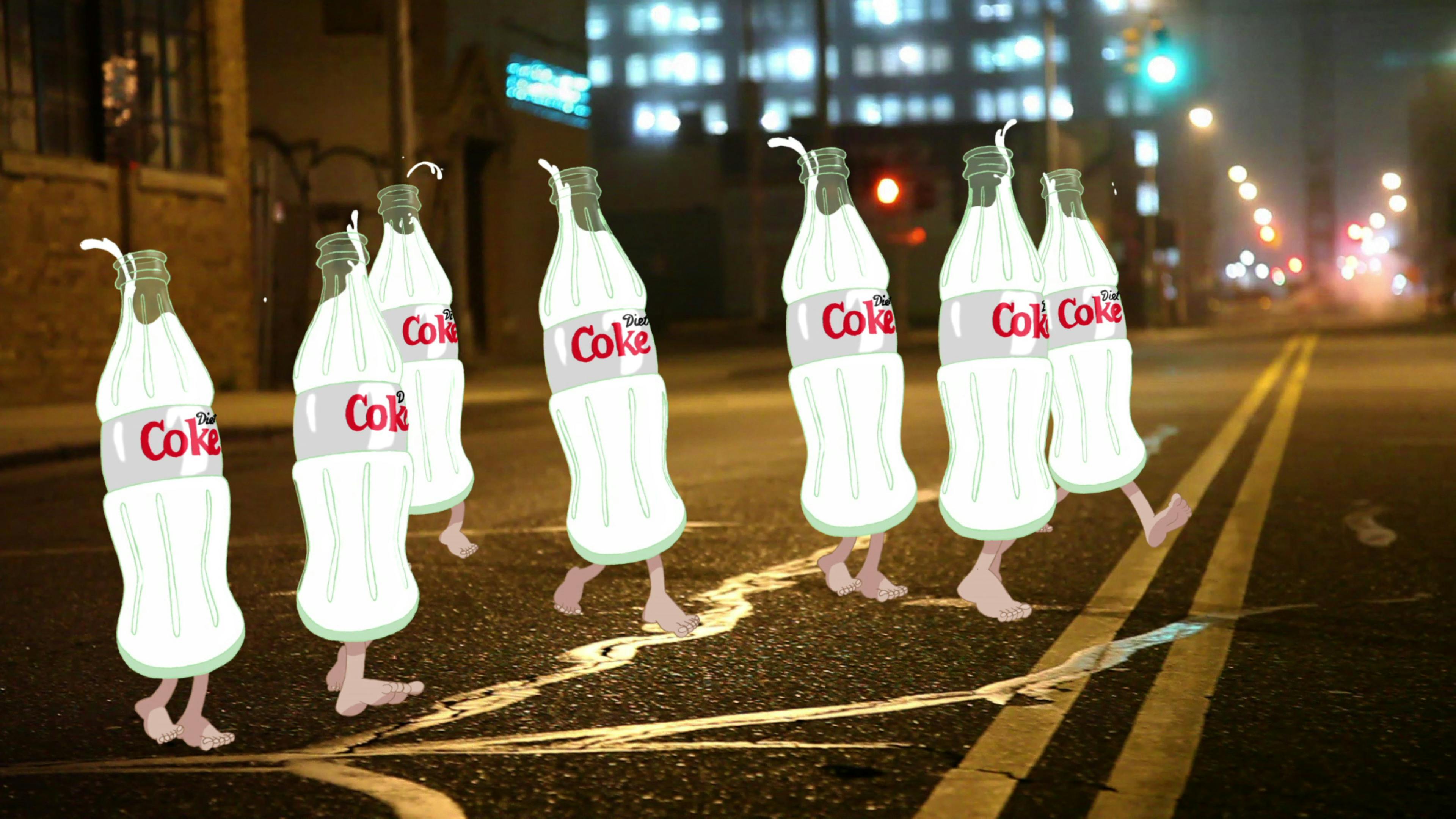 A photograph of a city street at night, taken from a low vantage point, is overlaid with 7 illustrated Coca-Cola bottles with white liquid. The bottles have bare feet and appear to cross the street.